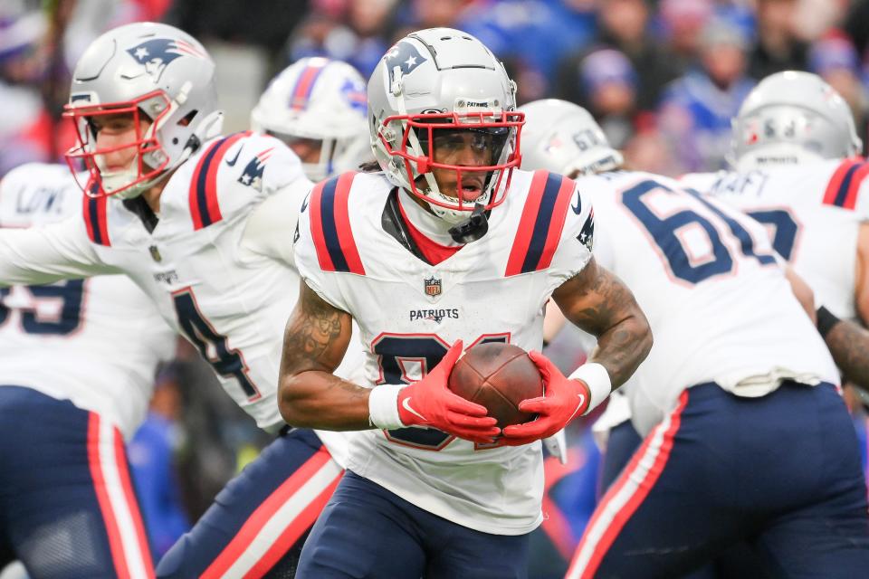 Patriots receiver DeMario Douglas looks for an opening during a game against the Buffalo Bills in December.