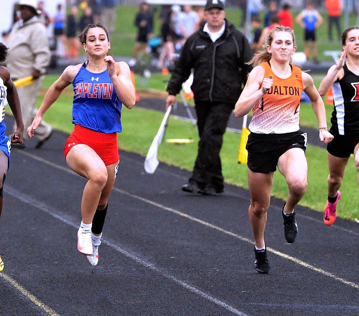 Mapleton's Jillian Carrick competes in the girls 100 meters at the Division III Perry Regional on Friday.