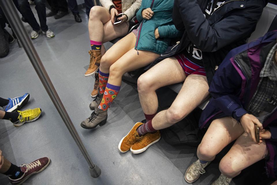 Passengers wear no trousers during the No Pants Subway Ride in Amsterdam on Jan. 13. (Photo: Olaf Kraak/AFP/Getty Images)