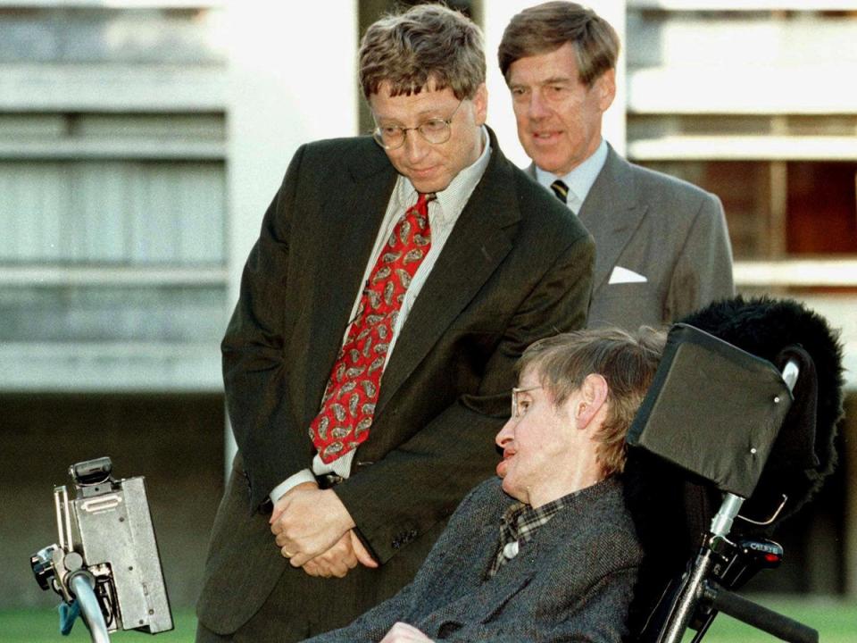 Bill Gates, accompanied by vice-chancellor Alec Broers, meets Hawking on a visit to Cambridge University in 1997 (Reuters)