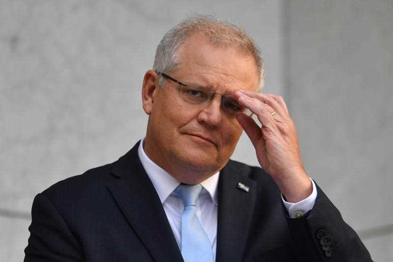 Prime Minister Scott Morrison speaks to the media at a press conference in Canberra.