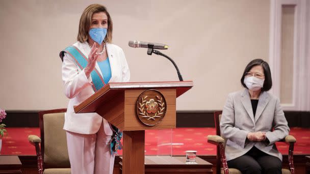 PHOTO: Nancy Pelosi left, speaks after receiving the Order of Propitious Clouds with Special Grand Cordon, Taiwan's highest civilian honor, from Taiwan's President Tsai Ing-wen, right, at the president's office on Aug. 3, 2022 in Taipei, Taiwan. (Handout/Getty Images)