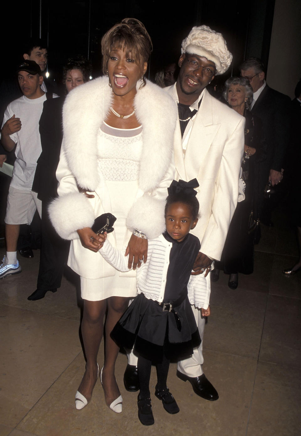 Singer Whitney Houston, singer Bobby Brown and daughter Bobbi Kristina Brown attend the Fourth Annual International Achievement in Arts Awards on October 11, 1998 at Beverly Hilton Hotel in Beverly Hills, California. (Photo by Ron Galella, Ltd./Ron Galella Collection via Getty Images)