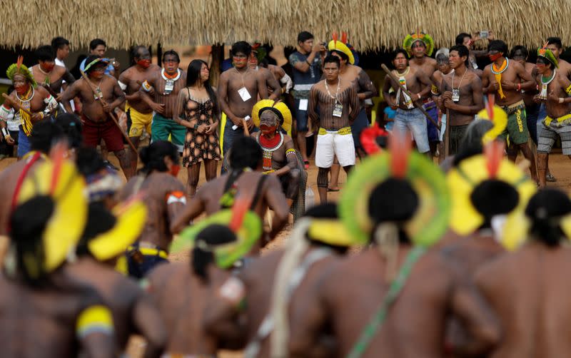 Indigenous leader Cacique Raoni of Kayapo tribe watches a performance of Kayapo people during a four-day pow wow near Sao Jose do Xingu,