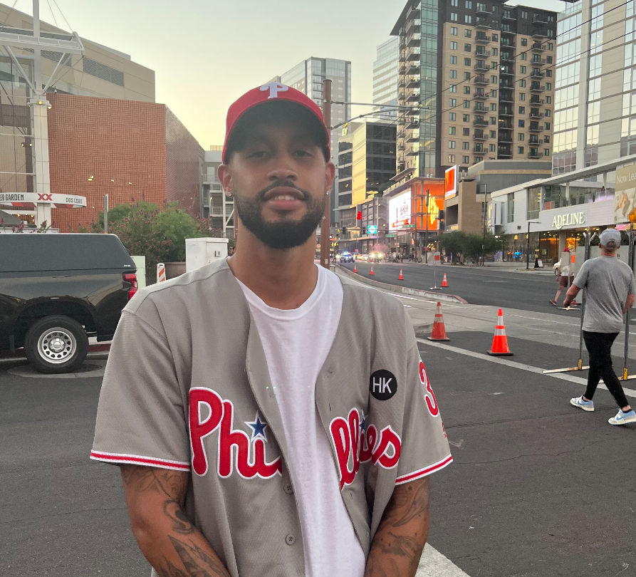 Phoenix resident and Phillies fan Reggie Dudley poses for a photo in downtown Phoenix on Thursday, Oct. 19, 2023.