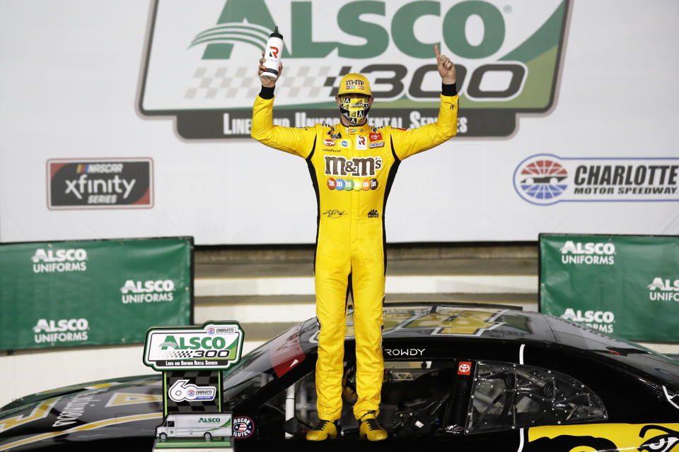 Kyle Busch celebrates after winning the NASCAR Xfinity Series auto race at Charlotte Motor Speedway Monday, May 25, 2020, in Concord, N.C. (AP Photo/Gerry Broome)