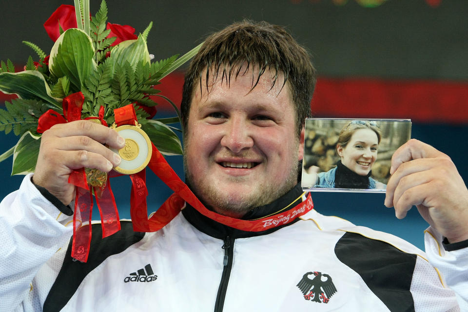 Austrian-born German weightlifter Matthias Steiner won the gold medal in the +105kg category at the 2008 Beijing Olympic Games. At the medals ceremony, Steiner stood on the medalists' podium with a photo of his late wife, Susann, who would otherwise have accompanied him to the Games. Susann died in a car accident on 16 July 2007.