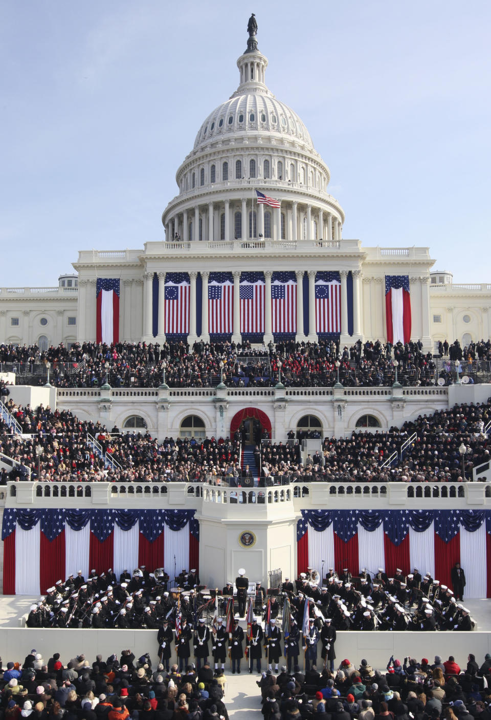 FILE - In this Jan. 20, 2009 file photo, President Barack Obama gives his inaugural address at the U.S. Capitol in Washington. Obama will raise his right hand and place his left on a Bible as he takes the oath of office for a second four-year term. His second inauguration promises the pageantry of the first, but on a smaller scale than 2009, when a record 1.8 million people filled the nation's capital to witness Obama making history as America's first black president. (AP Photo/Ron Edmonds, File)