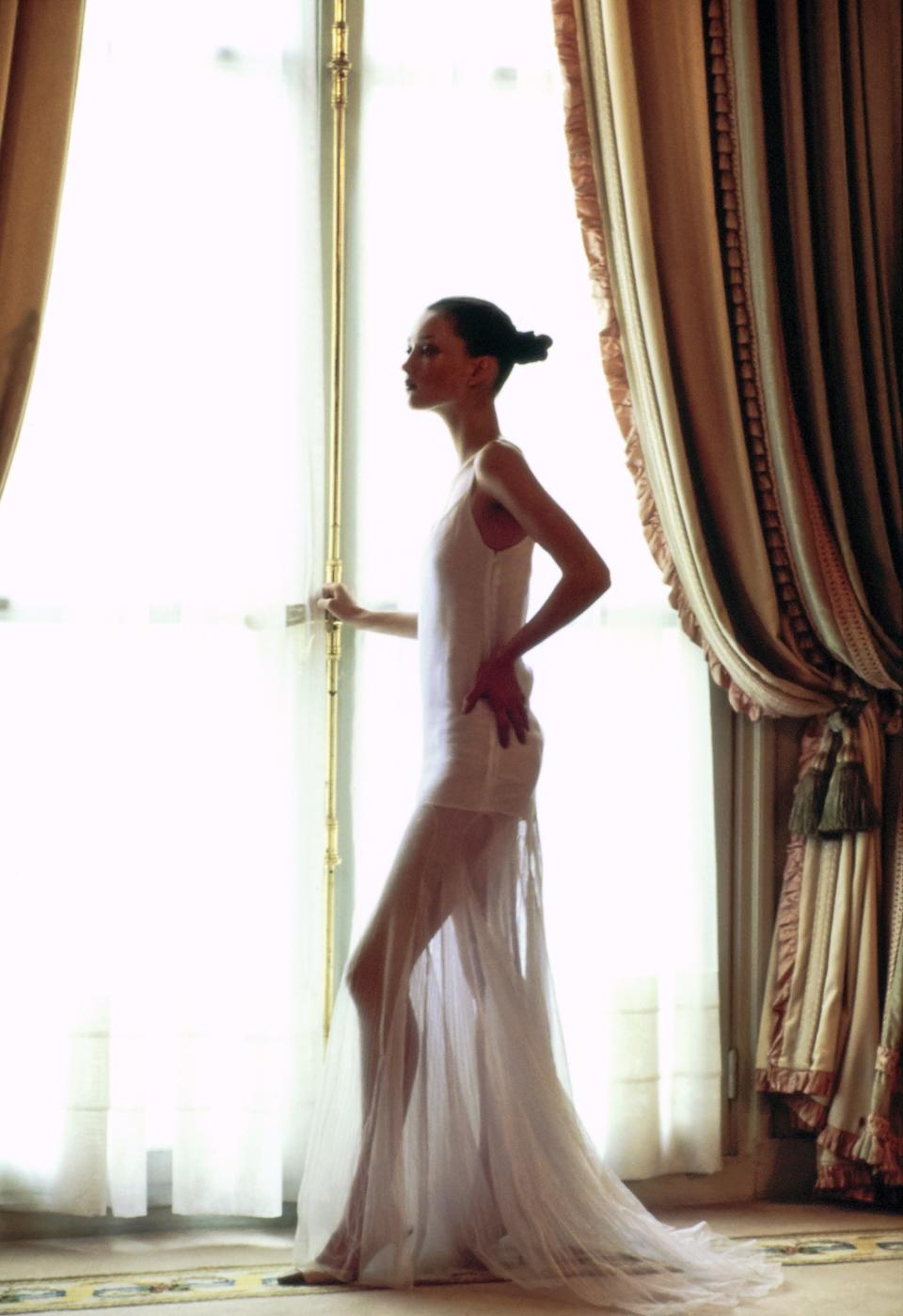 Audrey Marnay in a diaphanous dress by Chanel Haute Couture.