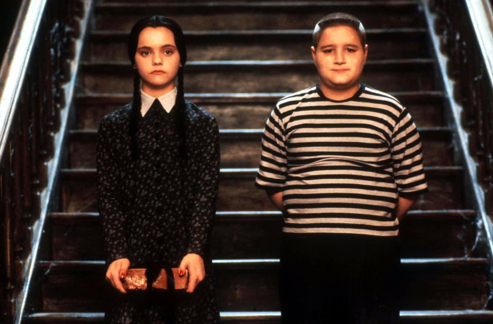 Christina Ricci as Wednesday Addams and Jimmy Workman as
Pugsley Addams in 
