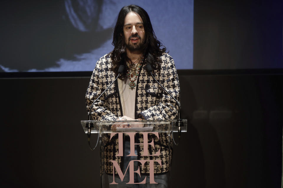 Gucci creative designer Alessandro Michele, presents this year's Costume Institute exhibition titled ''Camp: Notes on Fashion,'' at the Teatro Gerolamo, in Milan, Italy, Friday, Feb. 22, 2019. The exhibition will be shown at the Metropolitan Museum of Art of New York, from May 9-Sept. 8, 2019. (AP Photo/Luca Bruno)