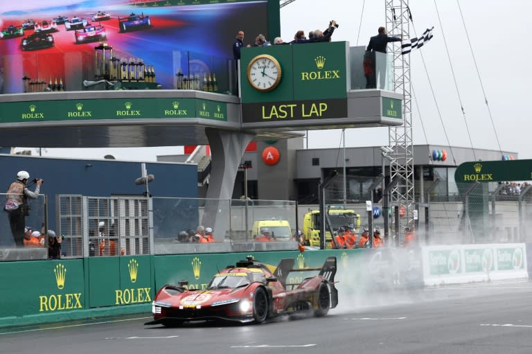 Nicklas Nielsen crosses the line in his Ferrari to win the Le Mans 24-hour race (FRED TANNEAU)