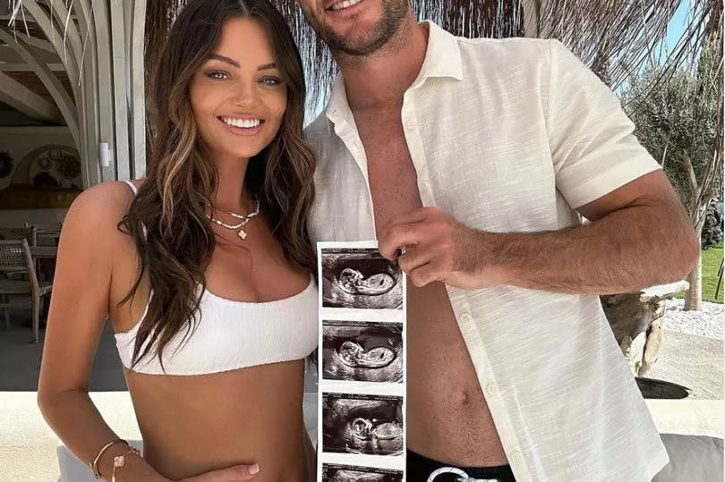 Kendall Rae Knight holds her baby ultrasound photos