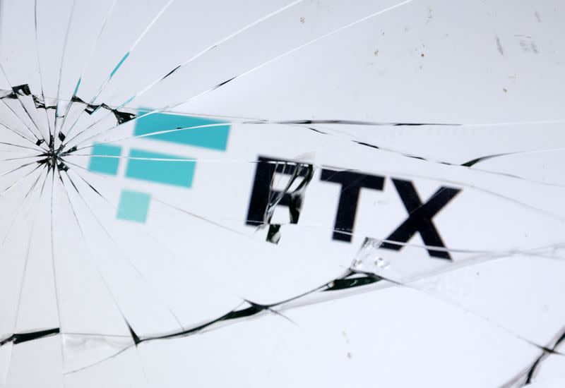 Illustration shows FTX logo and broken glass