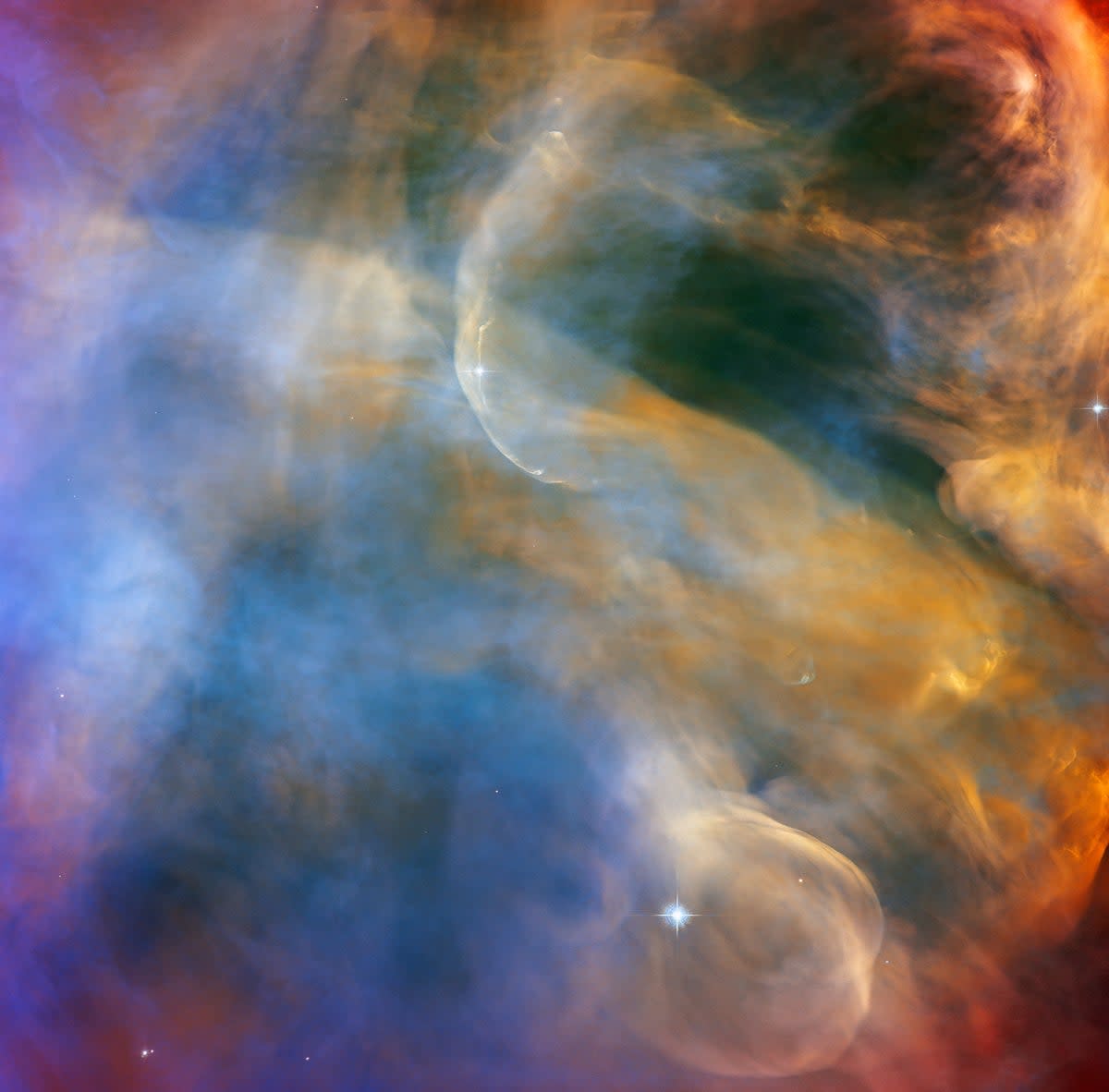 The Hubble Space Telescop reveals colorful outflows of stellar gas in the Orion Nebula (ESA/Hubble & NASA, J. Bally Ackn)