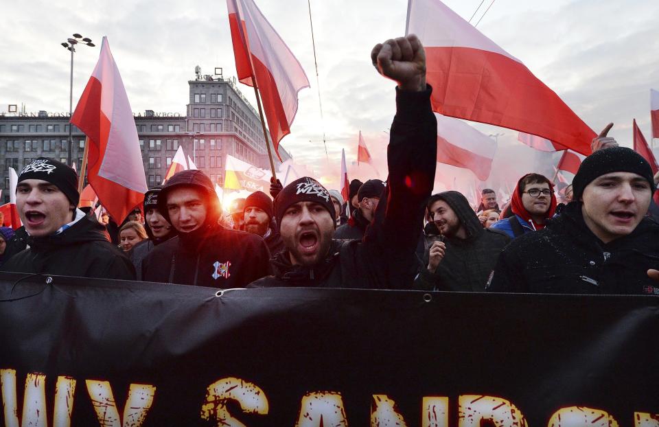 People take part in the March of Independence organized by far right activists to celebrate 101 years of Poland's independence in Warsaw, Poland, Monday, Nov. 11, 2019. (AP Photo/Czarek Sokolowski)