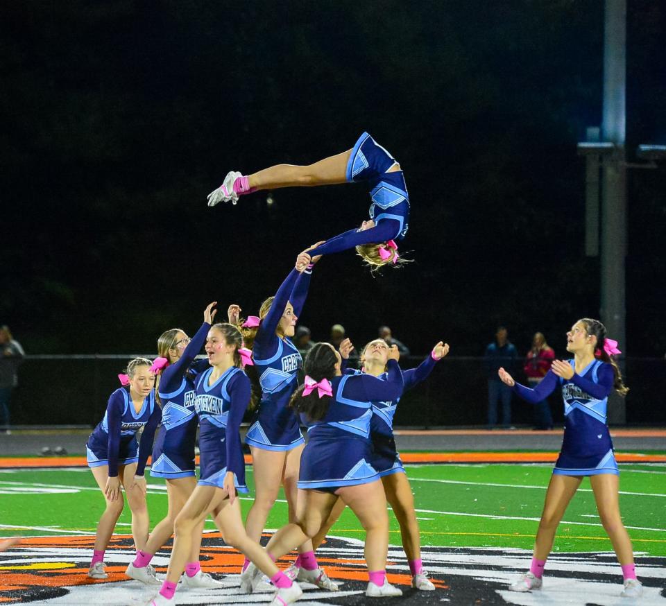 The Bristol-Plymouth cheerleaders perform during halftime of a football game against West Bridgewater on Oct. 13, 2023.
