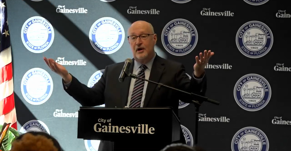 Gainesville Mayor Harvey Ward delivers the 2024 State of the City address on Tuesday morning at the Santa Fe College Blount Center.