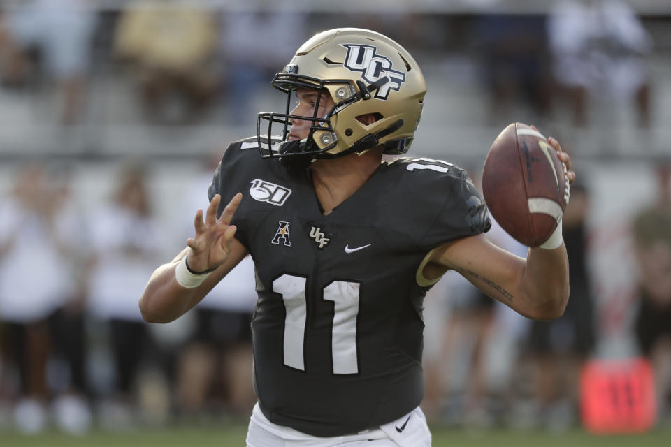 Central Florida quarterback Dillon Gabriel throws a 1-yard touchdown pass against Stanford during the second half of an NCAA college football game, Saturday, Sept. 14, 2019, in Orlando, Fla. (AP Photo/John Raoux)