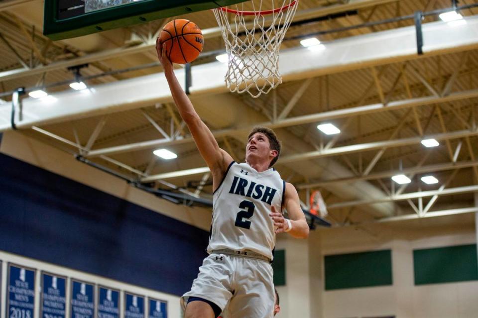 St. Patrick guard Nick Krass scores during a game against Perry Central at St. Patrick Catholic High School on Thursday, Jan. 13, 2022. Hannah Ruhoff/hruhoff@sunherald.com