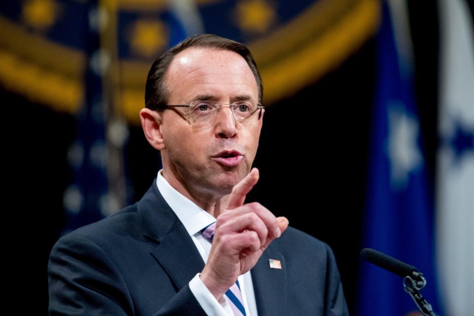In this May 9, 2019 file photo, then-Deputy Attorney General Rod Rosenstein speaks during a farewell ceremony in the Great Hall at the Department of Justice in Washington.