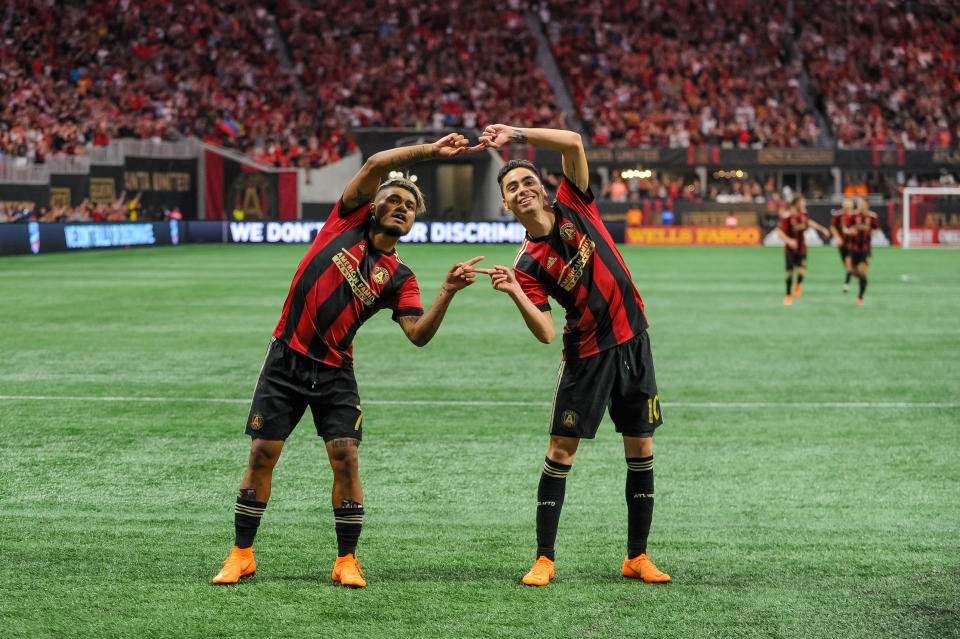 Josef Martínez and Miguel Almirón's "Fusion" celebration from their Atlanta United days. (Photo by John Adams/Icon Sportswire via Getty Images)