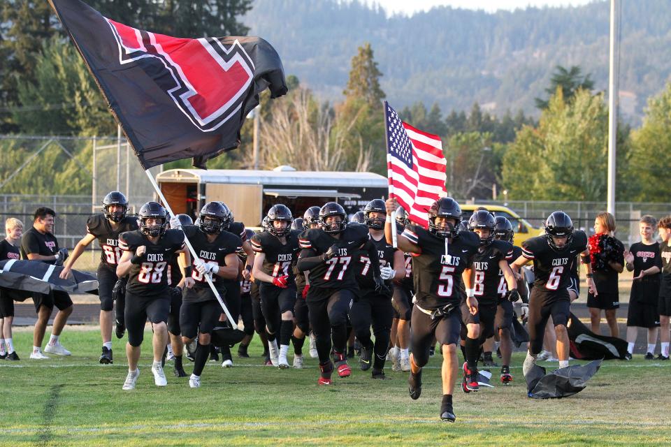 The Thurston football team runs onto the field before a nonleague game Sept. 3 against Wilsonville.