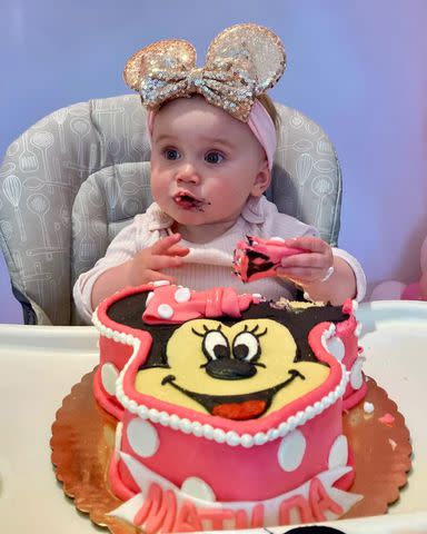 <p>Kaley Cuoco/Instagram</p> Matilda appeared to really enjoy her Minnie Mouse birthday cake