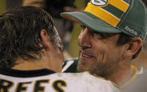 GREEN BAY, WI - SEPTEMBER 08: Aaron Rodgers #12 of the Green Bay Packers talks with Drew Brees #9 of the New Orleans Saints after the NFL opening season game at Lambeau Field on September 8, 2011 in Green Bay, Wisconsin. The Packers defeated the Saints 42-34. (Photo by Jonathan Daniel/Getty Images)