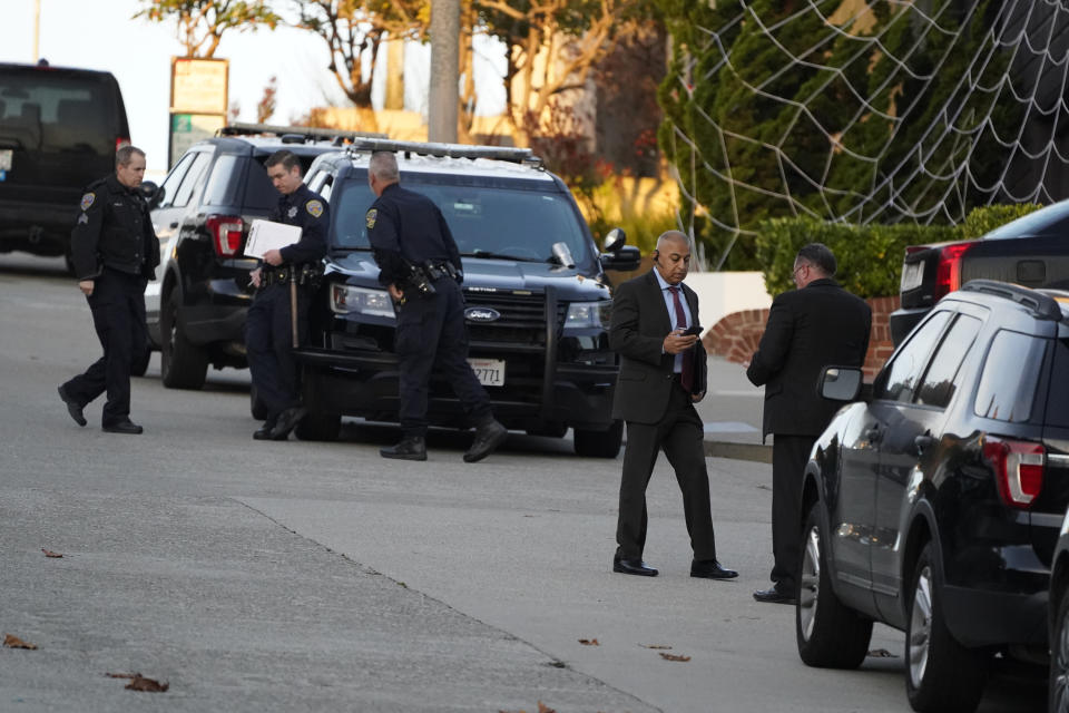 Law enforcement officials work outside the Pelosis' home in San Francisco on Oct. 28, 2022.