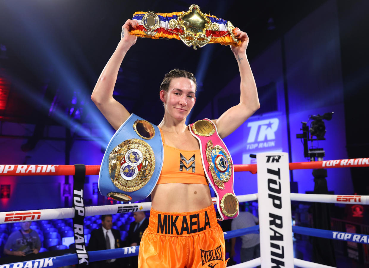 COSTA MESA, CALIFORNIA - APRIL 09: Mikaela Mayer is victorious as she defeats Jennifer Han during their WBO and IBF junior lightweight championship fight at The Hangar on April 09, 2022 in Costa Mesa, California. (Photo by Mikey Williams/Top Rank Inc via Getty Images)