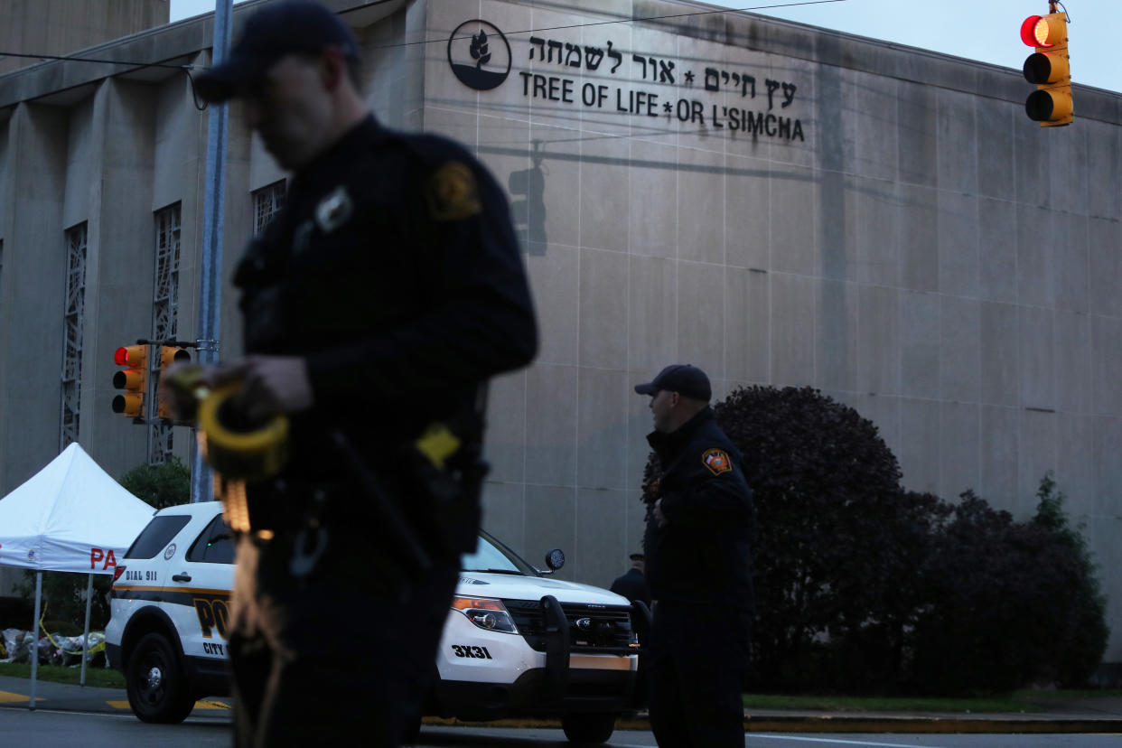 Police guard the Tree of Life synagogue after Saturday’s shooting. (Photo: Cathal McNaughton/Reuters)