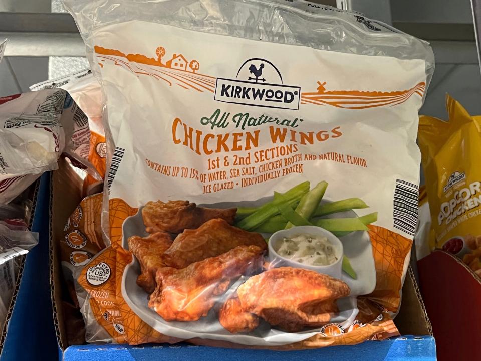 Brown bag of Kirkwood all-natural chicken wings with graphic of wings and celery on bag