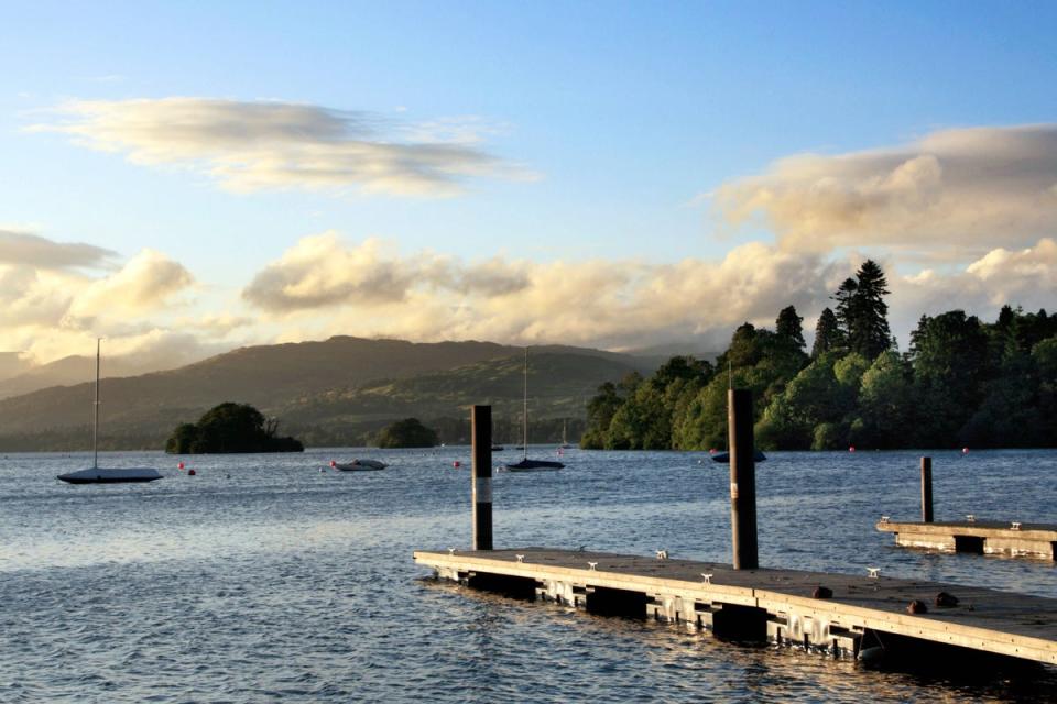 Lake Windermere at Bowness in the Lake District national park (PA )