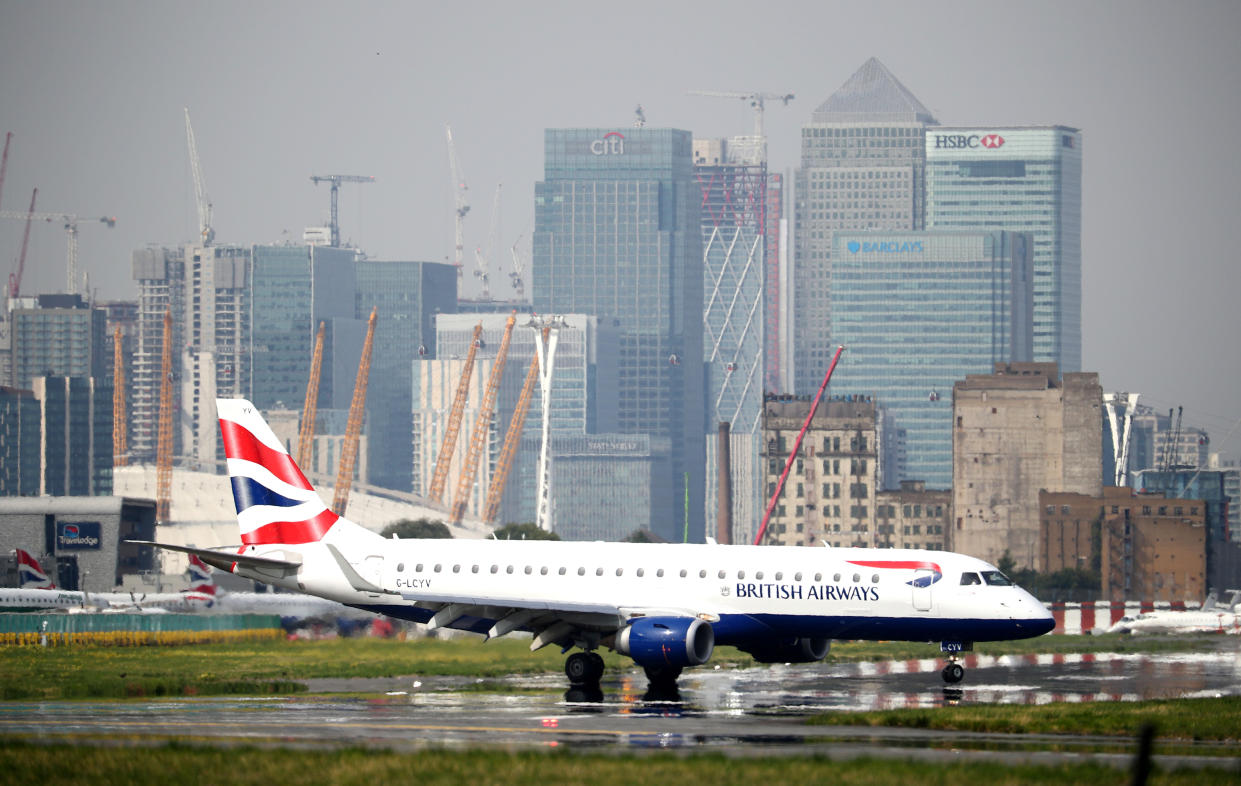 A British Airways Embraer ERJ-190SR airplane taxis at City Airport in London, Britain, September 3, 2018. REUTERS/Hannah McKay