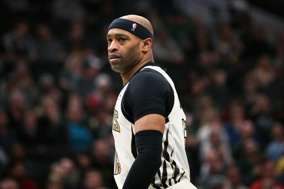 MILWAUKEE, WISCONSIN - APRIL 07:  Vince Carter #15 of the Atlanta Hawks walks across the court in the second quarter against the Milwaukee Bucks at the Fiserv Forum on April 07, 2019 in Milwaukee, Wisconsin. NOTE TO USER: User expressly acknowledges and agrees that, by downloading and or using this photograph, User is consenting to the terms and conditions of the Getty Images License Agreement. (Photo by Dylan Buell/Getty Images)