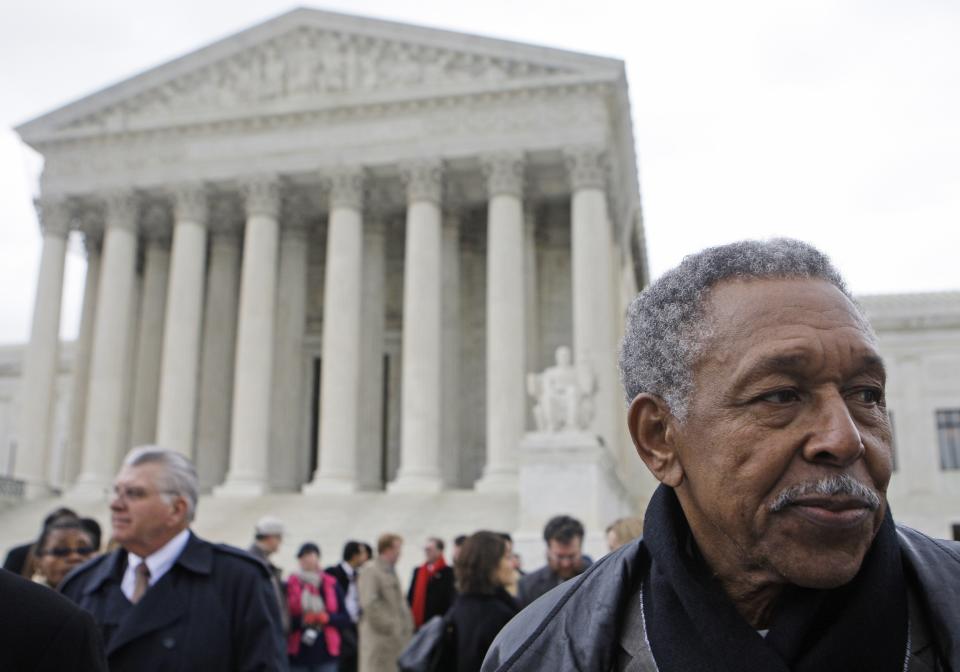 FILE - In this file photo taken March 2, 2010 in Washington, Otis McDonald, one of four plaintiffs in the Chicago handgun ban takes part in a news conference in front of the Supreme Court. McDonald, who was the lead plaintiff in the lawsuit that led the U.S. Supreme Court to overturn the Chicago's handgun ban has died. McDonald's death on Friday, April 4, 2014, was confirmed Sunday by his nephew and family spokesman, Fred Jones. McDonald was one of four plaintiffs who challenged the city's decades-old handgun ban and who won a 5-4 decision in 2010. He argued that he was trying to protect himself and his family from the violence outside his front door in a deteriorating neighborhood on Chicago's South Side. (AP Photo/Haraz N. Ghanbari)