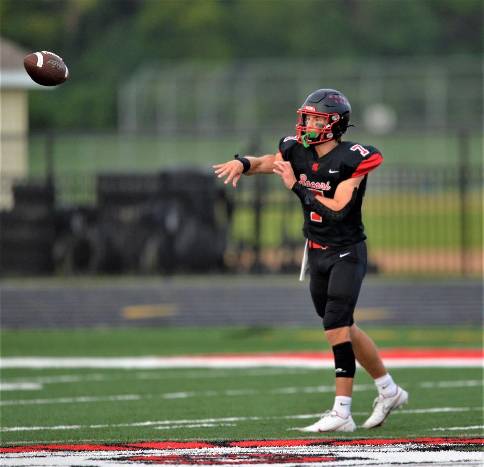 ROCORI's Jack Spanier throws a screen pass against Becker in the season opener on Friday, Aug. 26, 2022, at ROCORI High School.