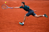 Taro Daniel of Japan plays a forehand during his mens singles first round match against Gael Monfils of France during Day three of the 2019 French Open at Roland Garros on May 28, 2019 in Paris, France. (Photo by Clive Mason/Getty Images)