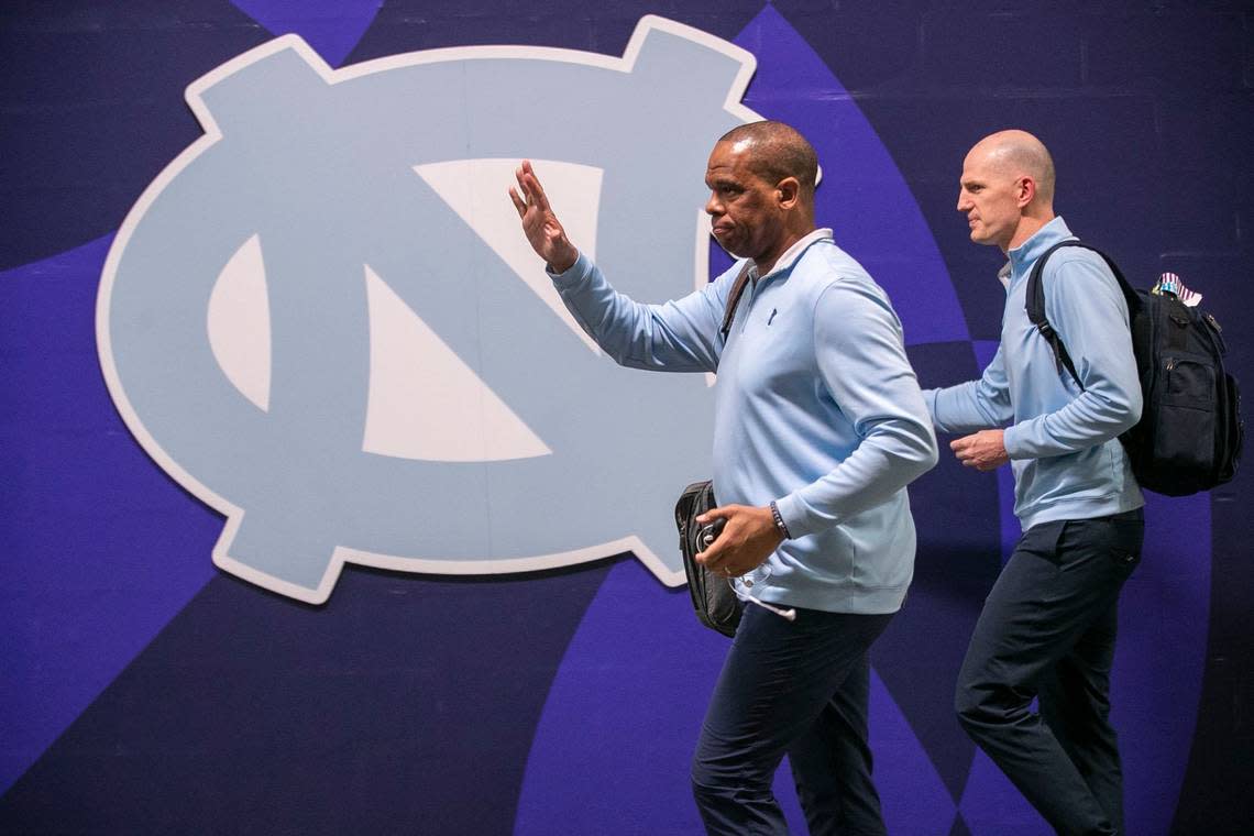 North Carolina coach Hubert Davis and assistant coach Brad Frederick arrive for their NCAA National Championship game against Kansas on Monday, April 4, 2022 at Caesars Superdome in New Orleans, La. Robert Willett/rwillett@newsobserver.com