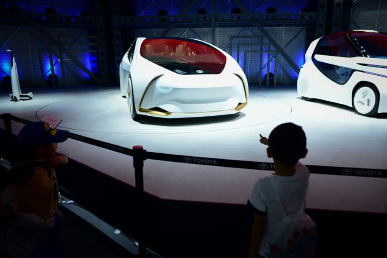 Toyota showed its i Ride concept car at the Beijing auto show, an electric vehicle with automated driving that is easy to enter for people with reduced mobility