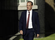 Conservative lawmaker Dominic Raab arrives at 10 Downing Street, London, Wednesday, July 24, 2019. Boris Johnson has replaced Theresa May as Prime Minister, following her resignation last month after Parliament repeatedly rejected the Brexit withdrawal agreement she struck with the European Union. Johnson seems to be clearing out top ministers, firing several members of former leader Theresa May's Cabinet. (AP Photo/Matt Dunham)