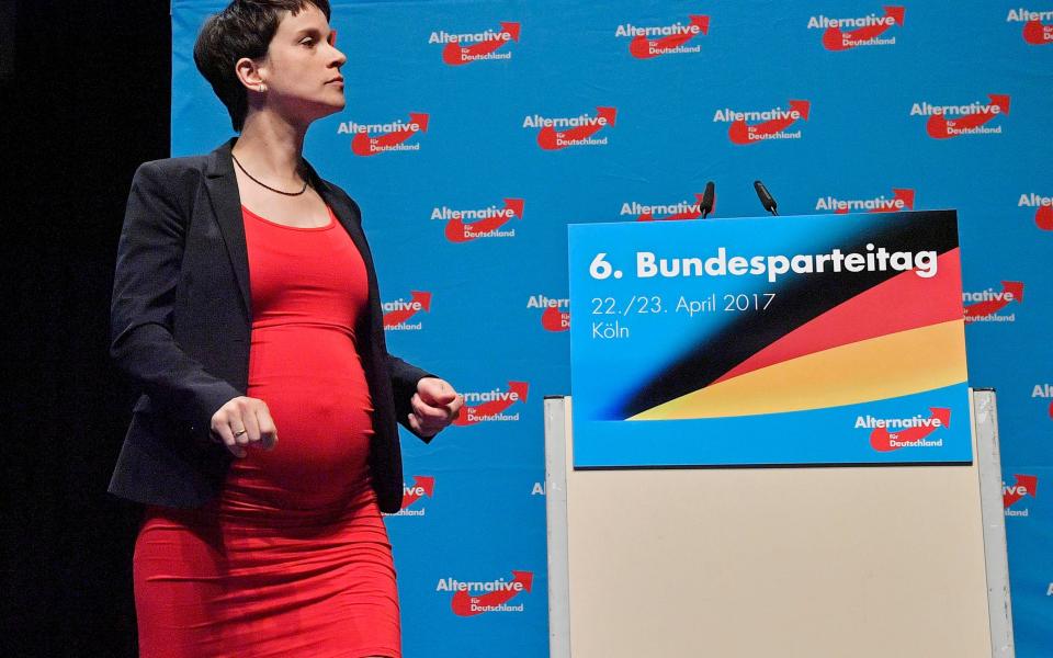 Co-leader Frauke Petry walks on the podium at the party convention - Credit: AP