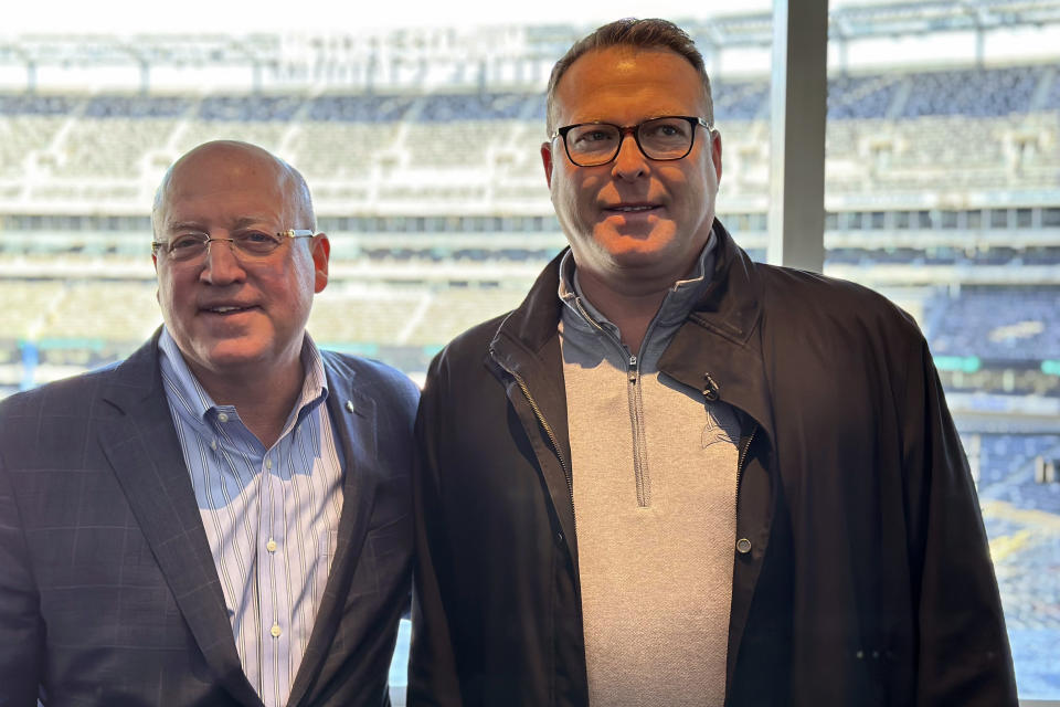 NHL Deputy Commissioner Bill Daly, left, and New Jersey Devils executive and Hockey Hall of Famer Martin Brodeur talk about this weekend's outdoor NHL Stadium Series hockey game at MetLife Stadium in East Rutherford, N.J., Thursday, Feb. 15, 2024. (AP Photo/Tom Canavan)
