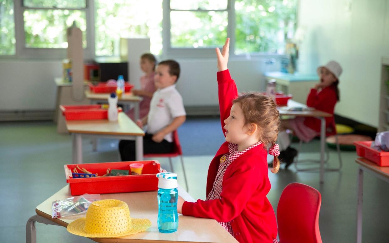 A socially-distanced Reception class at Abbotsweld Primary Academy in Harlow, Essex, as some pupils returned to the classroom - HEATHCLIFF O'MALLEY FOR THE TELEGRAPH