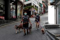 The Wider Image: On trial on riot charges, Hong Kong newlyweds prepared for life apart