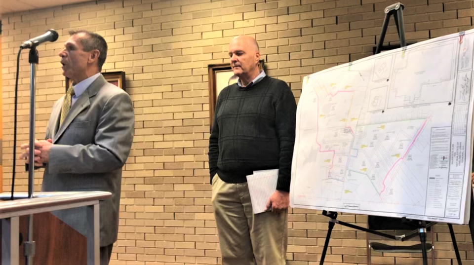 The Vineland Planning Board on Wednesday night reviewed and approved a first phase site plan for Trout National _ The Reserve, a golf course proposed for East Vineland. Project attorney Michael Fralinger (left) and engineer Tim Ruga testified on features of a maintenance facility and the extensive perimeter wall system. The exhibit next to them is the site plan map. The next plan to be submitted will be for the golf course proper in about six months. PHOTO: July 12, 2023.