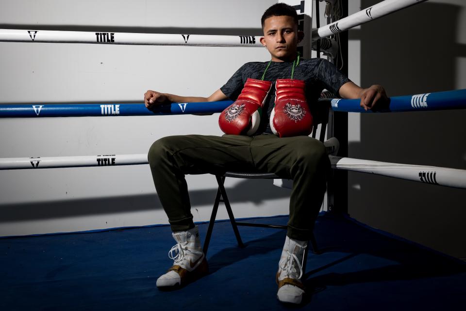 Up-and-coming 122-pounder boxer Ariel Moreno sits for a portrait where he trains at Pound 4 Pound Gym in East El Paso on Tuesday, April 18, 2023.