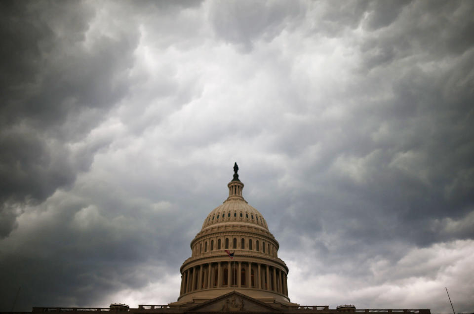 Storm clouds fill the sky over the U.S. Capitol Building, June 13, 2013 in Washington, D.C. (Photo by Mark Wilson/Getty Images)