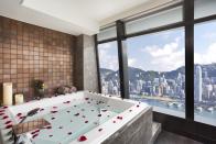 <p>Thanks to the <a rel="nofollow noopener" href="https://www.booking.com/hotel/hk/the-ritz-carlton-hong-kong.en-gb.html?label=gen173nr-1DCAEoggJCAlhYSDNiBW5vcmVmaFCIAQGYAS64AQbIAQzYAQPoAQGSAgF5qAID;sid=3a2a3416e89e08236fe2947256c10124;all_sr_blocks=28846606_98932334_0_2_0;checkin=2017-11-27;checkout=2017-11-28;dest_id=-1353149;dest_type=city;dist=0;group_adults=2;hapos=1;highlighted_blocks=28846606_98932334_0_2_0;hpos=1;room1=A%2CA;sb_price_type=total;srepoch=1510055600;srfid=cb8f791e122373c4c6bcc58f9b51ef7436cad43fX1;srpvid=212a5397a91c040d;type=total;ucfs=1&#hotelTmpl" target="_blank" data-ylk="slk:Hong Kong Ritz-Carlton;elm:context_link;itc:0;sec:content-canvas" class="link ">Hong Kong Ritz-Carlton</a>, you can scrub yourself while taking in a number of wow-factors. From the historic Victoria harbour to the skyline set in front of beautiful, green mountains, there's a lot to see while having a scrub.</p>